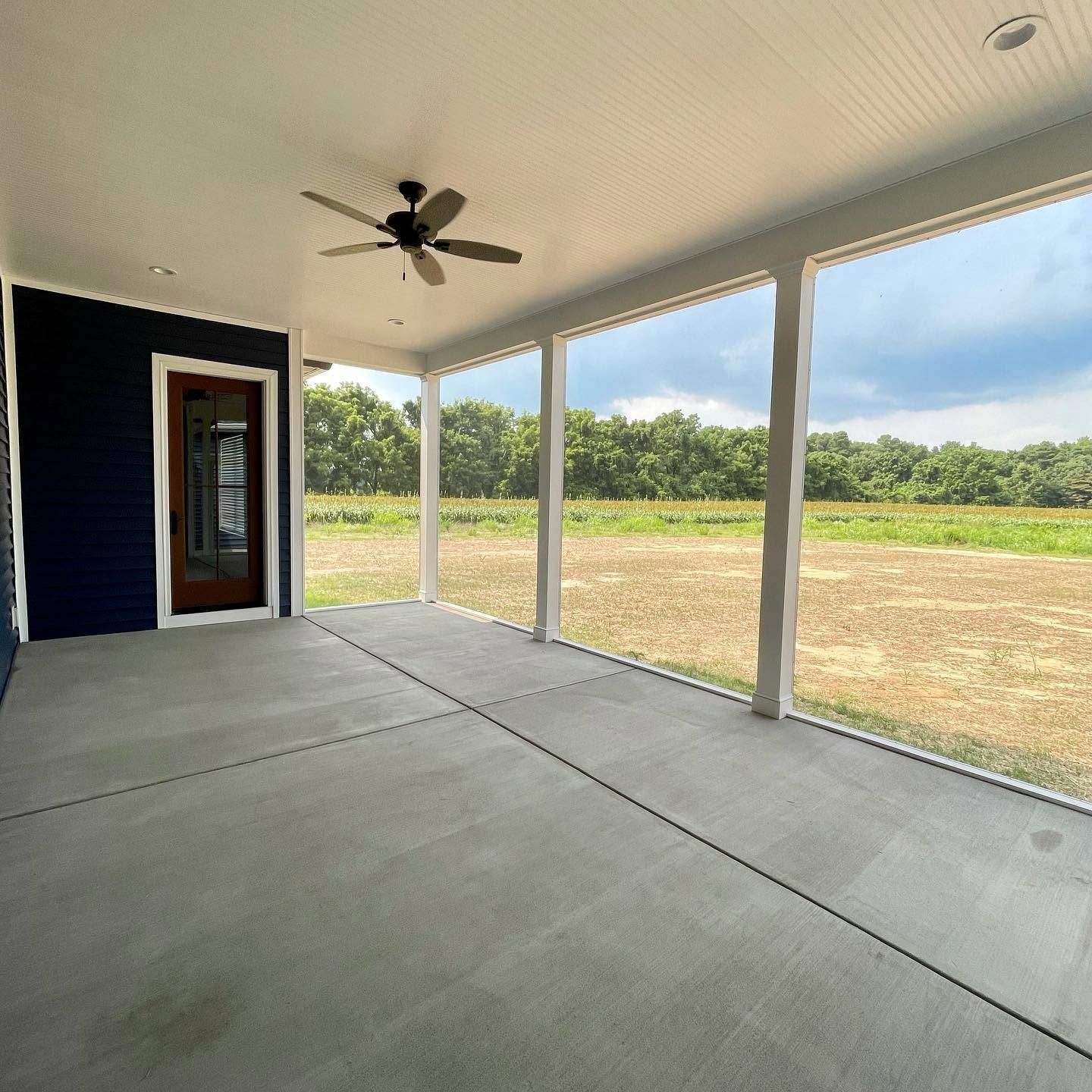 Rear screened porch of the Prospect Hill custom home