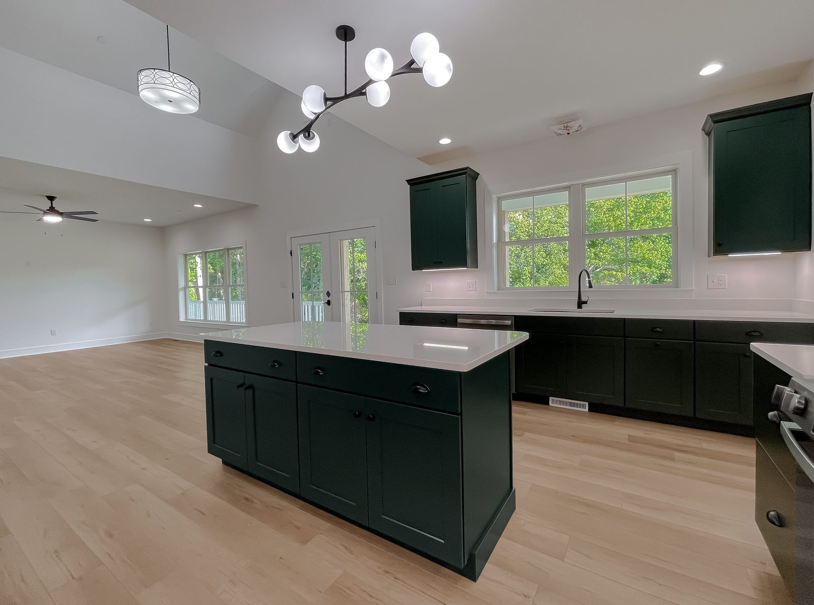 Custom kitchen with green island at the St. Jerome's Neck custom home, St. Mary's County MD